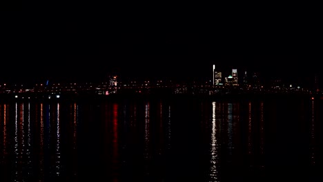 Jet-Airplane-Passes-By-Philadelphia-PA-and-Delaware-River-And-Lands-at-Airport--panning-shot