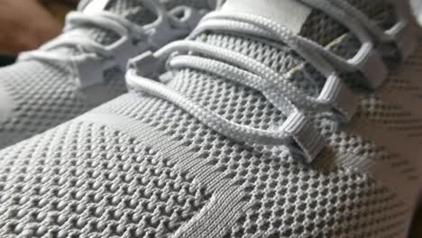 Closeup-sports-unbranded-woven-grey-white-comfortable-trainers