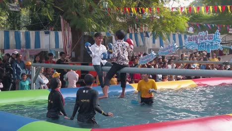 Slow-Motion-Shot-of-Kids-Fighting-for-Fun-at-the-Funfair