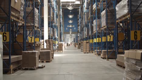 Inside-The-Warehouse-Storage-With-Forklifts-Moving-And-Transporting-The-Products