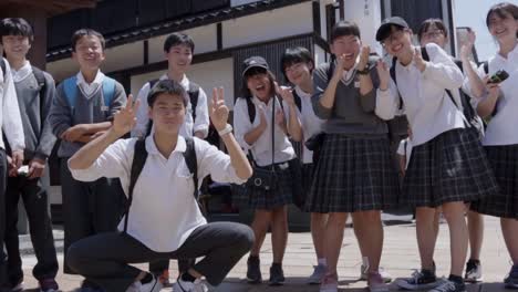 Slowmotion-of-Cheerful-Japanese-Crowd-Wearing-School-Uniform-in-Kanazawa,-Japan---Slow-Motion-Shot