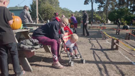 Cute-baby-and-his-mommy-at-a-Halloween-festival