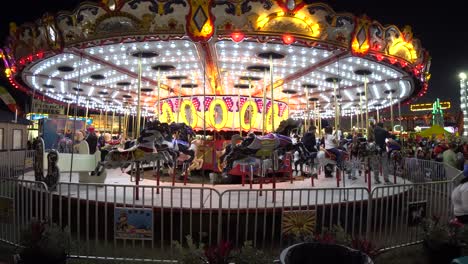 Tracking-Shot-of-Carousel-at-Florida-State-Fair-at-Night-in-Slow-Motion