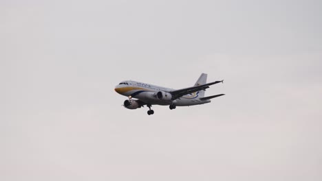 Myanmar-Airways-International-Airbus-A319-111-XY-AGV-approaching-before-landing-to-Suvarnabhumi-airport-in-Bangkok-at-Thailand