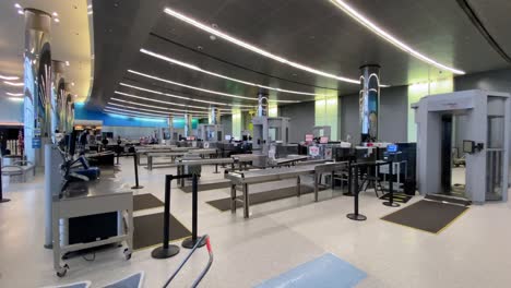 Boston,-Massachusetts---USA---April-9,-2020:-Panning-Shot-Of-Empty-TSA-Security-Checkpoint-at-Boston-Logan-International-Airport-During-COVID19-Pandemic