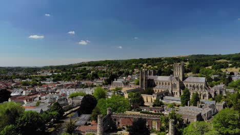 Aerial-view-of-Wells-Cathedral-and-the-moat-in-Bishops-Palace,-Somerset