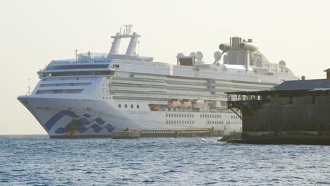 Coral-Princess-Cruise-Ship-Under-Quarantine-At-The-Harbor-Of-Curacao---Passengers-Not-Allowed-To-Go-Out-During-Coronavirus-Pandemic---medium-shot