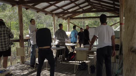 Group-Of-Men-Jumping,-Dancing-And-Shaking-Body---Manhood-Workshop---Queensland,-Australia