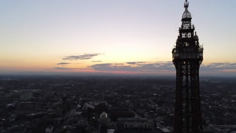 British-seaside-town-skyline-aerial-view-panning-right-to-Blackpool-tower-top