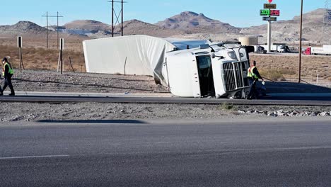 Flipped-semi-truck-with-emergency-responders-on-scene