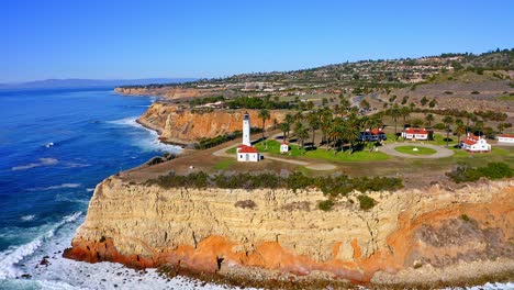 Aerial-view-panning-up-at-the-light-house-on-the-cliffs-of-Rancho-Palos-Verdes-in-Southern-California