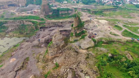 Trucks-and-diggers-work-in-Brown-Canyon-opencast-mine-in-Semarang-Indonesia