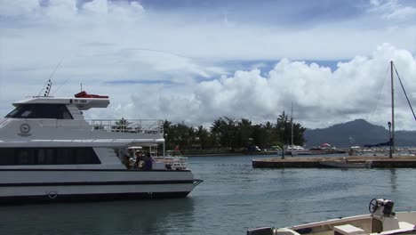 Yachts-and-sail-boats-anchored-in-the-bay-near-Uturoa,-Raiatea,-French-Polynesia