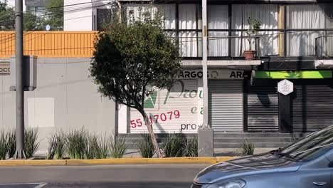 slow-motion-shot-of-mexico-city-sidewalks-and-streets-at-morning