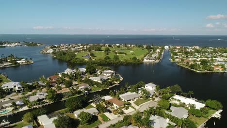 "Anna-Maria-Island,-FL---USA---11-14-2020:-Drone-push-in-clip-toward-Key-Royale-Club-golf-course-in-Anna-Maria-Island