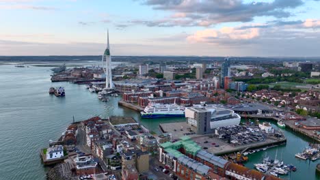 Drone-zoom-in-towards-the-Spinnaker-Tower-Portsmouth-with-Ferry-in-Port-at-Sunset-4K