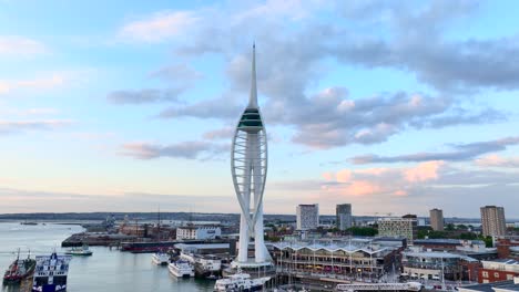 Drone-Pull-out-of-the-Spinnaker-Tower-Portsmouth-from-close-up-at-sunset-4k