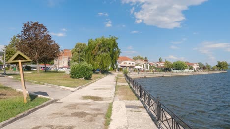 Pan-shot-of-Tranquil-scene,-Katsari-park-promenade-on-the-lakeside-in-Ioannina,-Greece