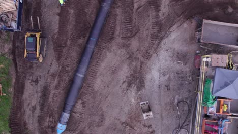 Overhead-aerial-of-water-main-pipe-construction-site-in-Michigan