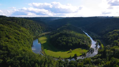 Aerial-view-of-Ardennes-with-beautiful-blue-sky-in-France-tracking-wide-shot
