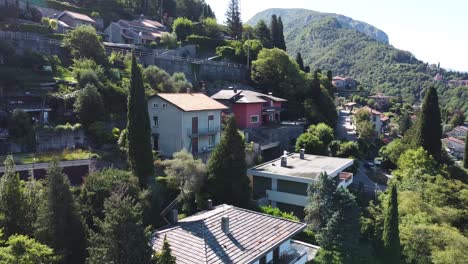 Aerial-trucking-shot-of-Verdana-Village-at-Lake-Como-in-Italy-during-summer