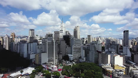 Drone-shot-around-buildings-in-the-city-center-of-Sao-Paulo,-sunny-day-in-Brazil