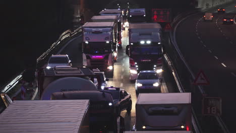 Estabisher-shot-of-ambulance-and-police-trying-to-pass-through-heavy-traffic