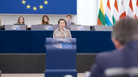 Member-of-the-European-Parliament-talking-during-the-EU-plenary-session-in-Strasbourg,-France---Close-shot