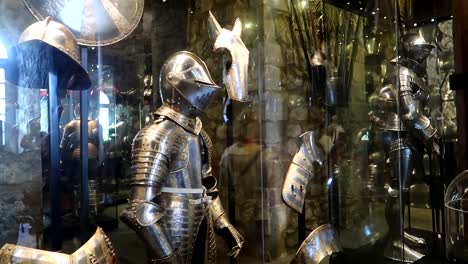 Slow-dolly-shot-of-a-warrior's-metal-armour-statue-on-display-in-the-Tower-of-London