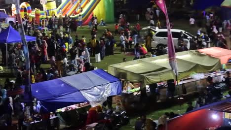 Crowd-of-carnival-at-night-celebrates-the-anniversary-of-city