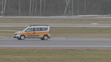 A-technical-car-inspects-the-runway-at-Gdansk-airport