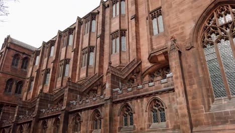 Entrance-facade-of-John-Ryland's-research-institute-and-library-in-Manchester-and-part-of-Manchester-University,-England,-UK