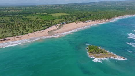 Aerial-panoramic-shot-showing-beautiful-landscape-of-Arroyo-Saldo,-sandy-beach-and-clear-Caribbean-Sea