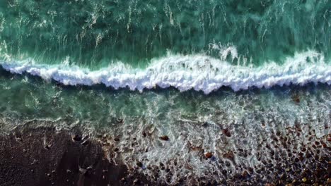 Turquoise-waves-on-beach-top-down-4k-Aerial-shot-from-Tenerife