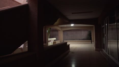 Abandoned-post-apocalyptic-location-with-a-blinking-light,-scary-and-creepy-location-inside-a-mall