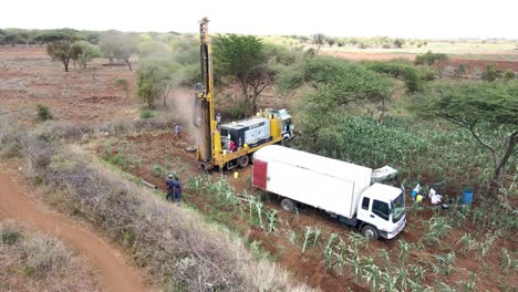 Rig-borehole-site-foundation-concrete-dusty-fume