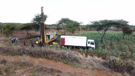 Rig-borehole-site-foundation-concrete-dusty-fume