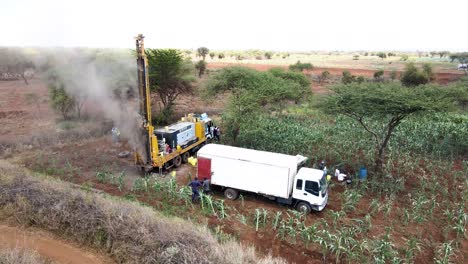 Rig-borehole-site-foundation-concrete-dusty-fume