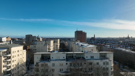 Drone-view-over-Stockholm-student-housing,-Albano,-Ruddammsbacken,-winter-day