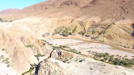 drone-shot-of-a-canyon-in-bousaada-algeria-Sky-view