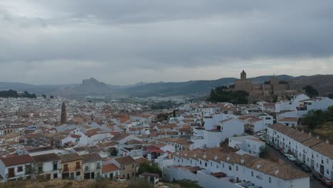 Aerial-views-with-drone-over-the-monumental-city-of-southern-Andalusia-in-Antequera,-Málaga,-views-of-its-castle-and-monumental-area-of-said-world-heritage-city