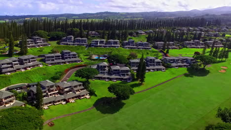 Aerial-ascending-shot-showing-group-of-luxury-apartment-in-rural-area-of-Hawaii
