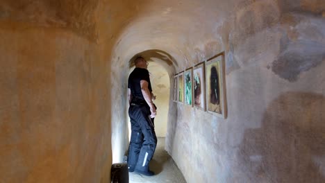 Tunnel-in-the-town-of-Betong-with-2-caucasian-men-inside