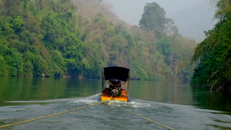 River-boating-in-the-middle-of-the-beautiful-forest-landscape-settings