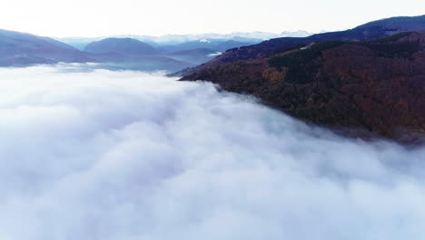 Flying-over-the-clouds-that-cover-the-valley