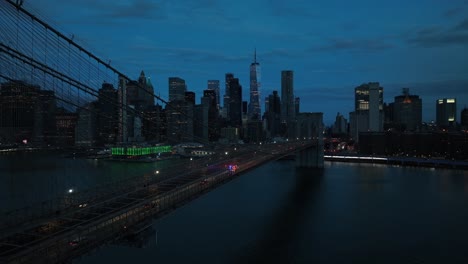 An-aerial-view-of-the-Brooklyn-Bridge-and-lower-Manhattan-in-the-background-in-the-early-morning