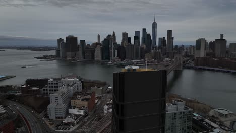 An-aerial-view-from-behind-the-luxury-condo,-the-Olympia-DUMBO-in-Brooklyn