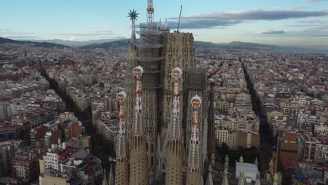 Drone-shot-of-La-Sagrada-in-Barcelona---drone-is-circling-around-the-top-of-the-famous-church