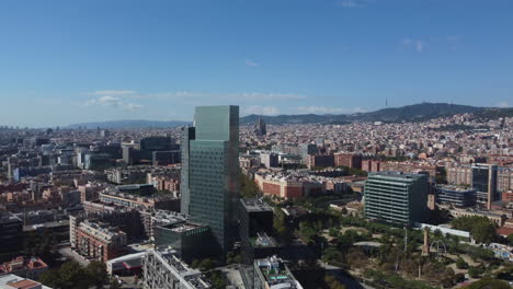 Drone-Shot-Of-Barcelona-City-Center---Video-Is-Showing-Torre-Glòries,-La-Sagrada-And-Av