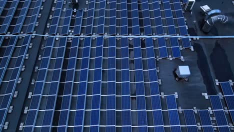 the-drone-shot-of-solar-panels-on-the-roof-of-industrial-building